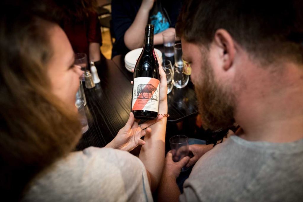 Inspecting a wine bottle